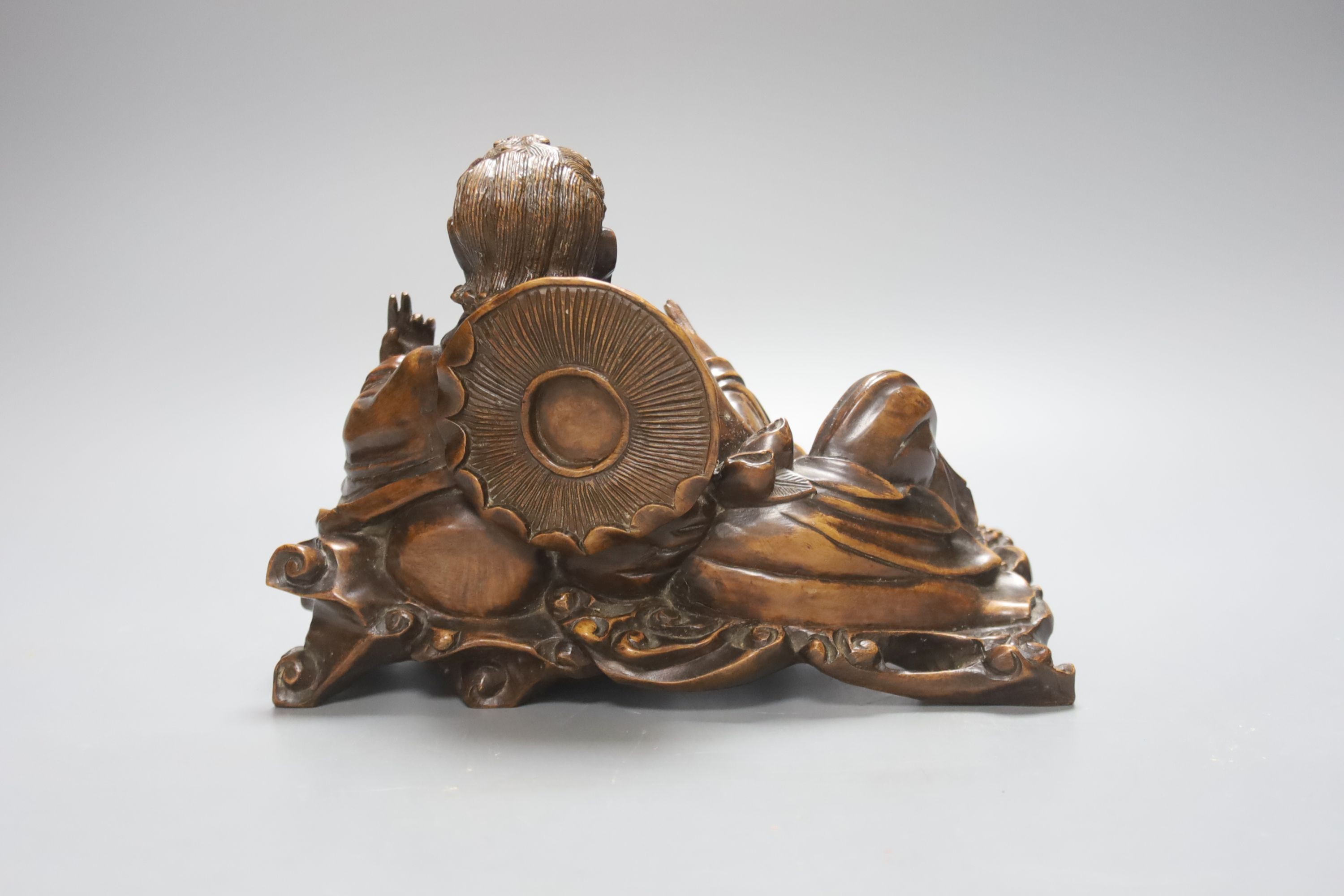 A Chinese hardwood group of Liu Hai and his three legged toad, 23cm